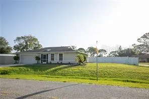 a view of a house with a big yard