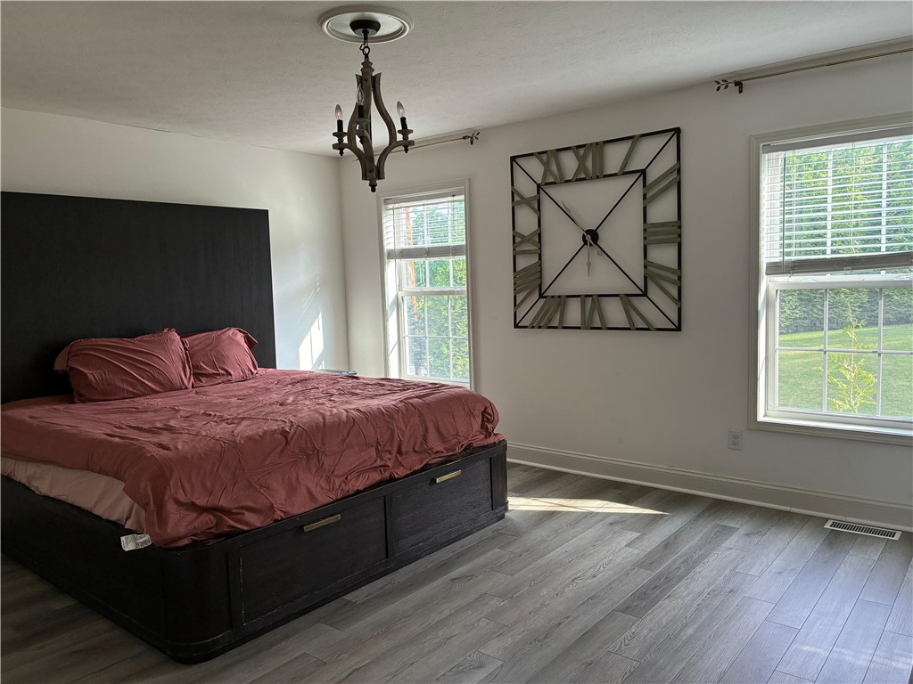 18 Dona Lea Road Perinton, NY 14450 - Photo 16 of 29 A spacious Primary Bedroom Sanctuary Awaits You