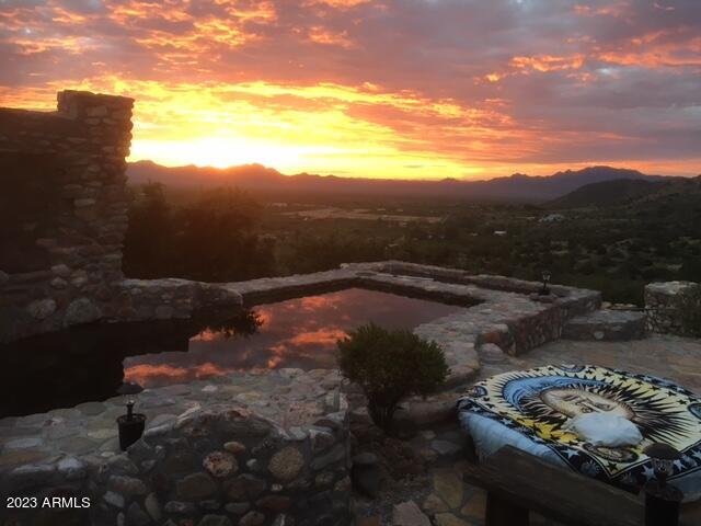 2411 South Wandervogel Way San Simon, AZ 85632 - Photo 27 of 42 Natural Stone Pool and Viewing Patio