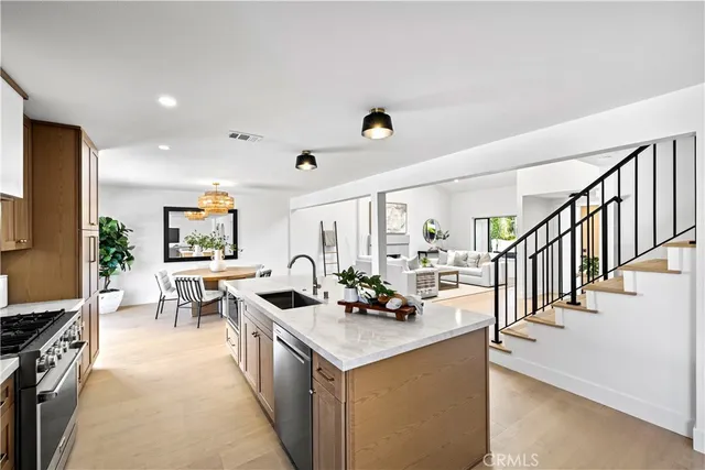 a view of living room with furniture and flat screen tv