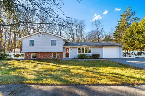 a view of a house with a swimming pool