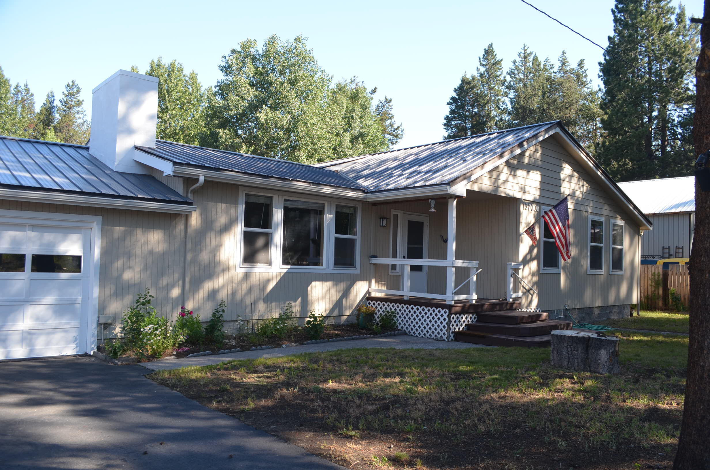 137008 Main Street Crescent, OR 97733 - Photo 2 of 50 a front view of a house with garden