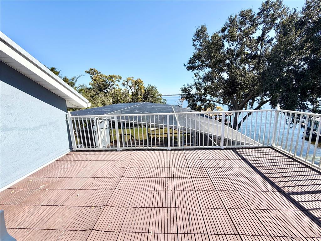 5243 West Lake Butler Road Windermere, FL 34786 - Photo 29 of 43 a view of balcony with wooden floor
