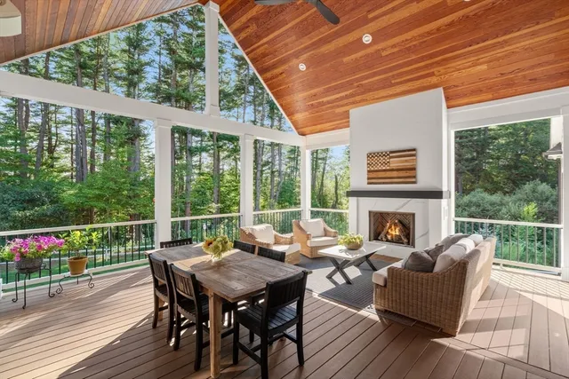 a balcony with furniture and a swing