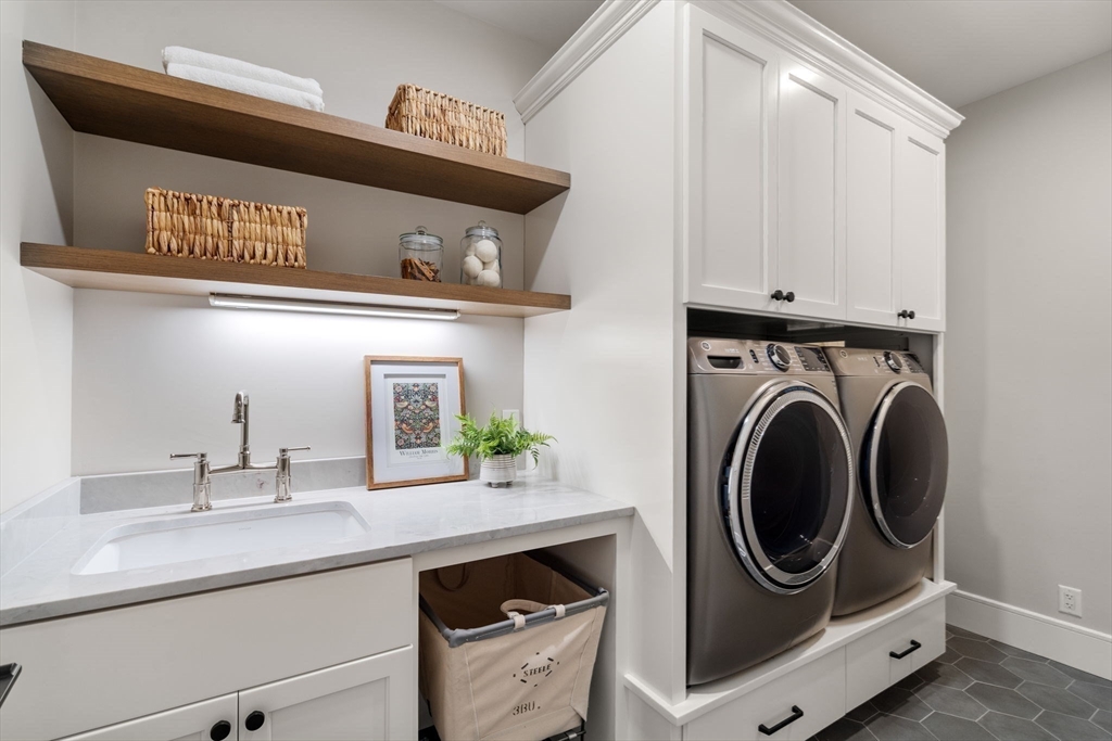 12 Ariana Lane Norfolk, MA 02056 - Photo 17 of 41 a utility room with dryer and washer