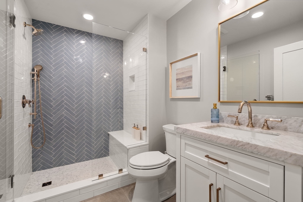 12 Ariana Lane Norfolk, MA 02056 - Photo 20 of 41 a bathroom with a sink toilet and shower