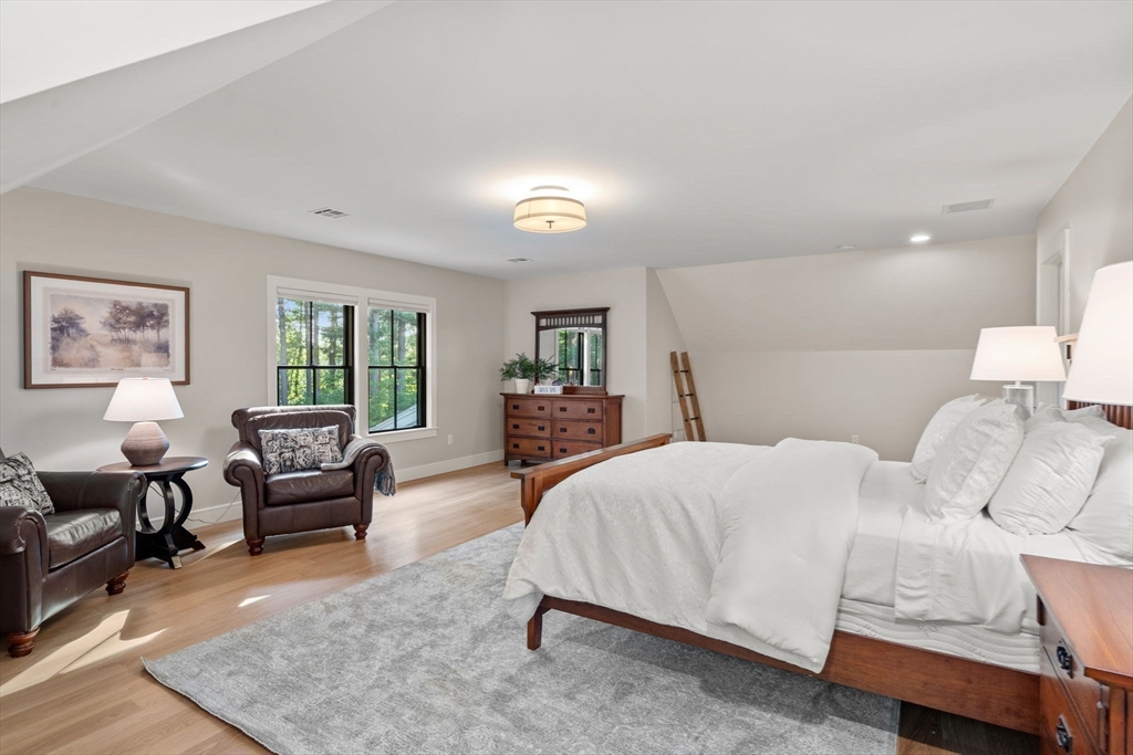 12 Ariana Lane Norfolk, MA 02056 - Photo 26 of 41 a bedroom with a bed and furniture