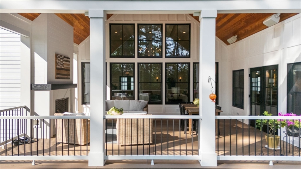 12 Ariana Lane Norfolk, MA 02056 - Photo 36 of 41 a view of a brick house with large windows