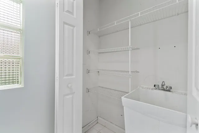 a bathroom with a sink toilet and vanity