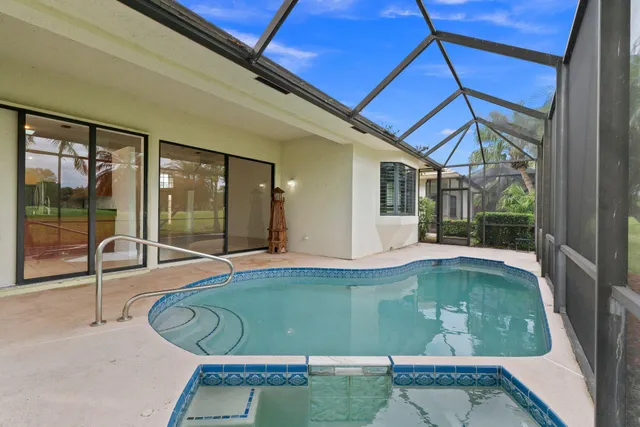 a view of swimming pool from a window