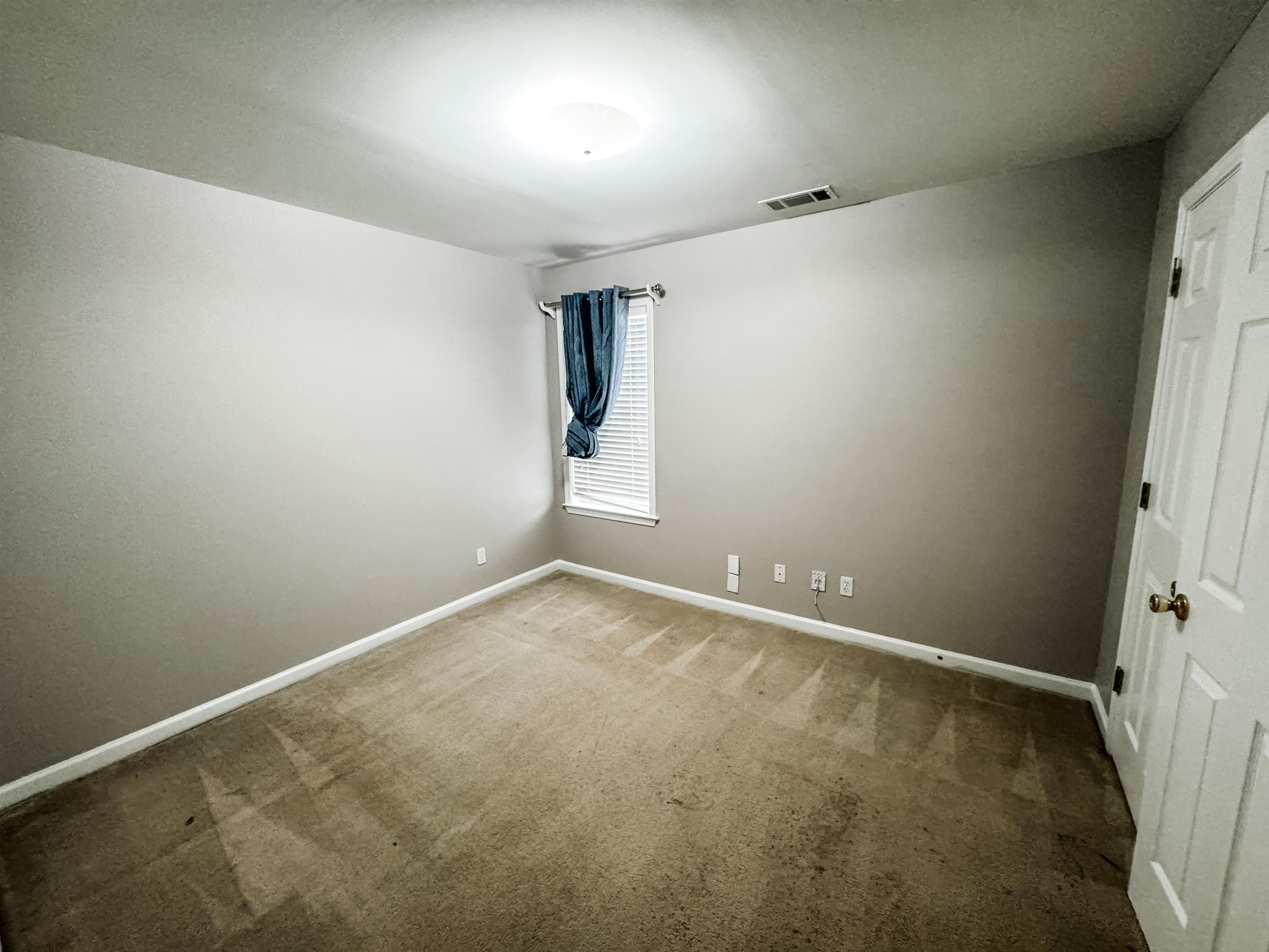 4564 Park Ridge Parkway Collierville, TN 38017 - Photo 8 of 12 Unfurnished room featuring light colored carpet and baseboards