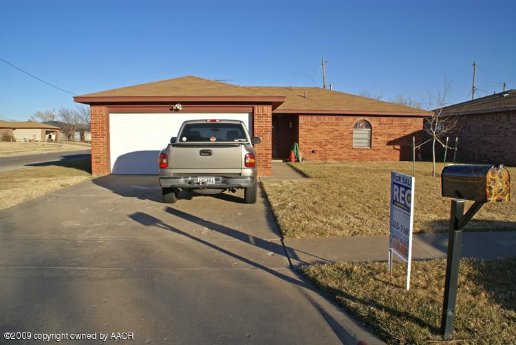 5301 Capulin Lane Amarillo, TX 79110 - Photo 2 of 18 a front view of a house with parking area