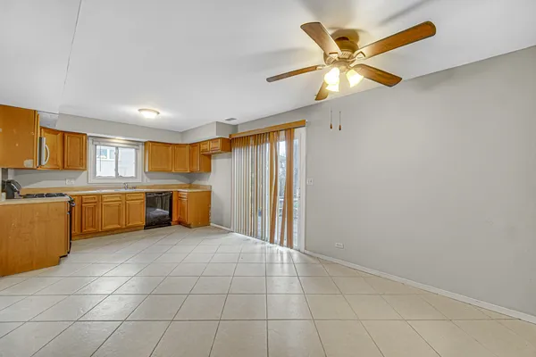 a view of a kitchen with a sink and a window