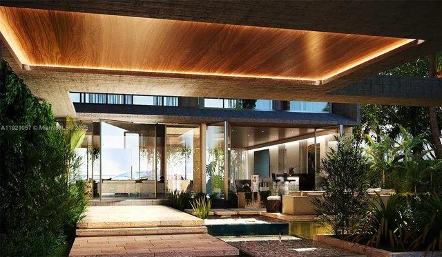 a view of a patio with table and chairs potted plants and floor to ceiling window