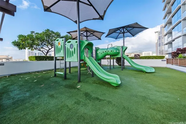 a view of a park with a slide