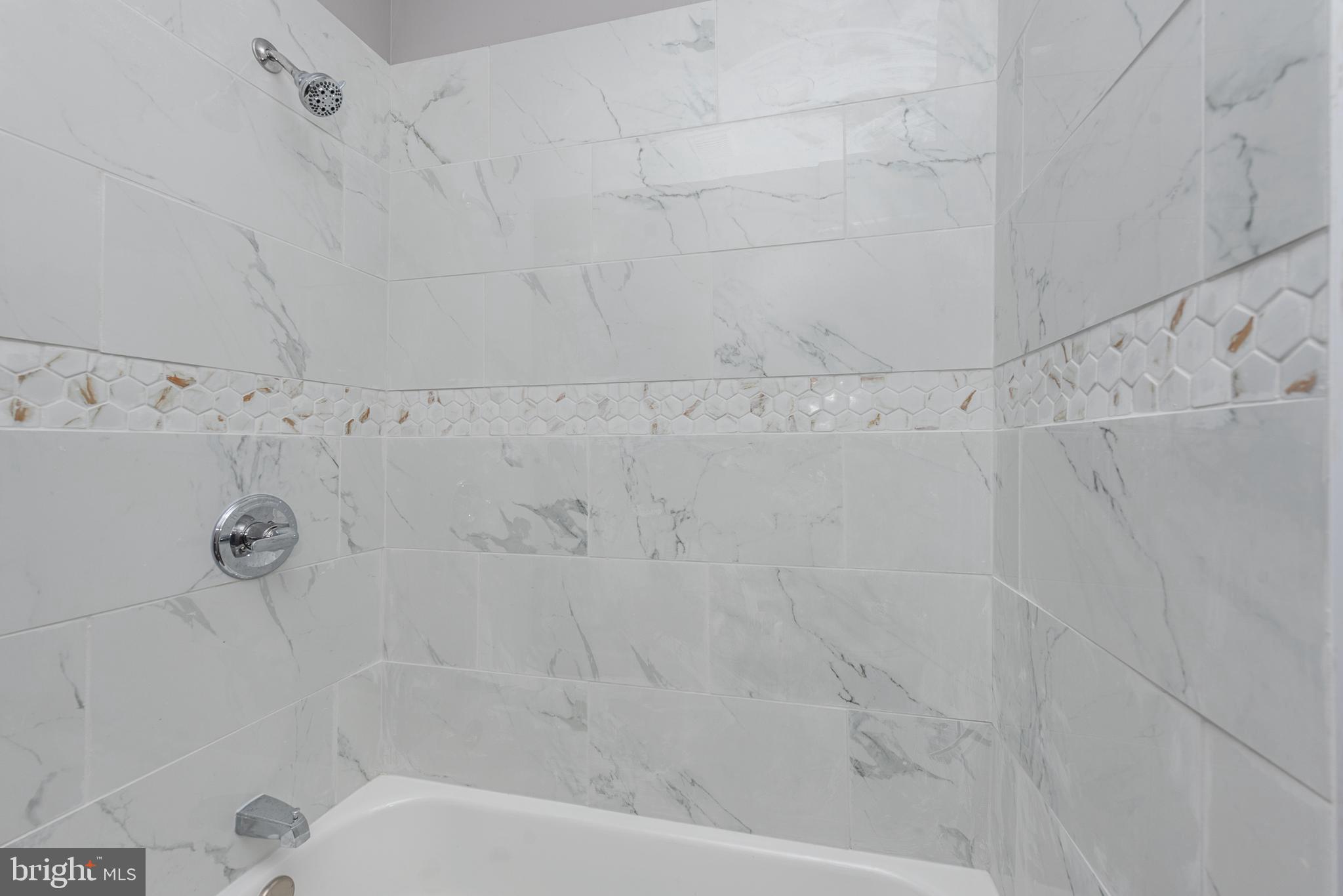 2143 Druid Hill Avenue, Unit 2 Baltimore, MD 21217 - Photo 9 of 20 a bathroom with a shower