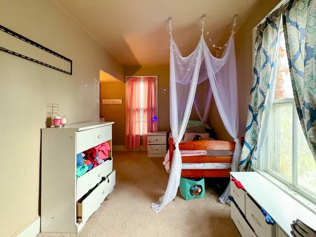 a room with toys and white walls