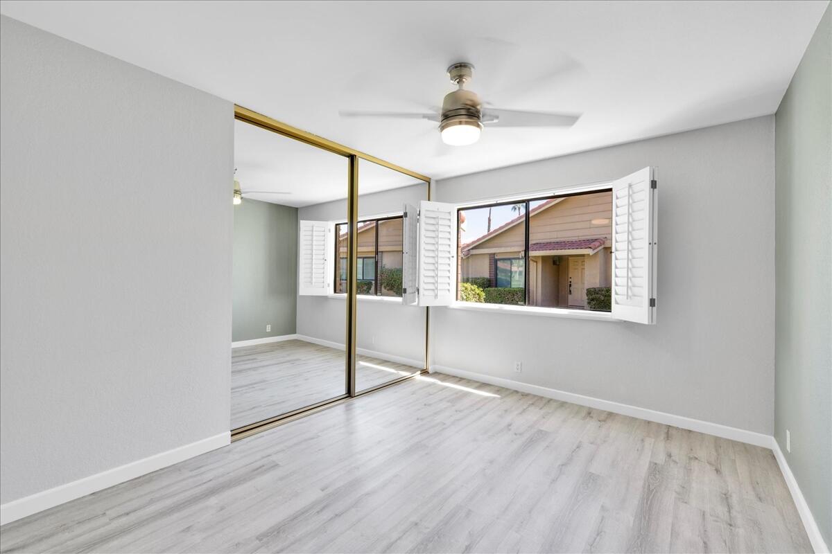 49 Maximo Way Palm Desert, CA 92260 - Photo 20 of 33 a view of an empty room with a window