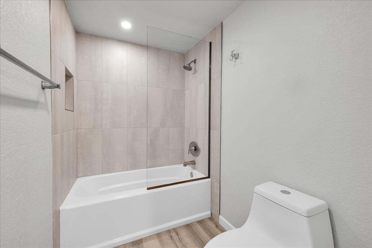 49 Maximo Way Palm Desert, CA 92260 - Photo 23 of 33 a bathroom with a toilet and a shower