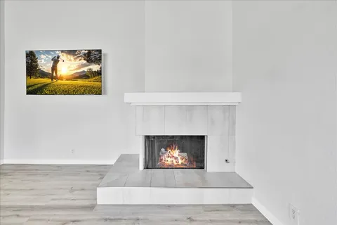 a living room with a fireplace