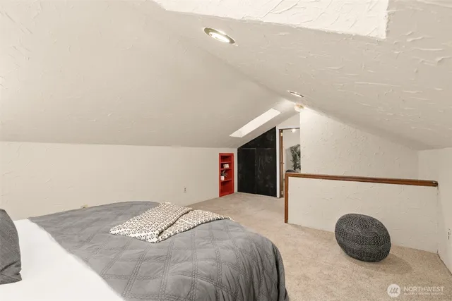 a bedroom with a bed and closet