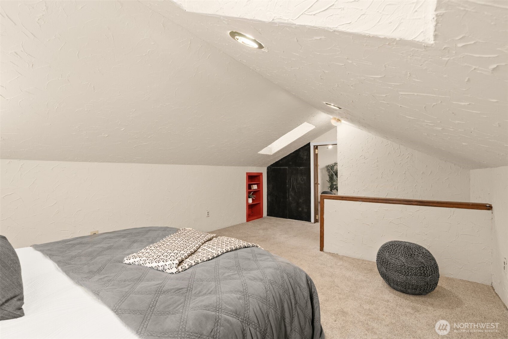 19124 Southeast 213th Street Renton, WA 98058 - Photo 19 of 33 a bedroom with a bed and cabinets