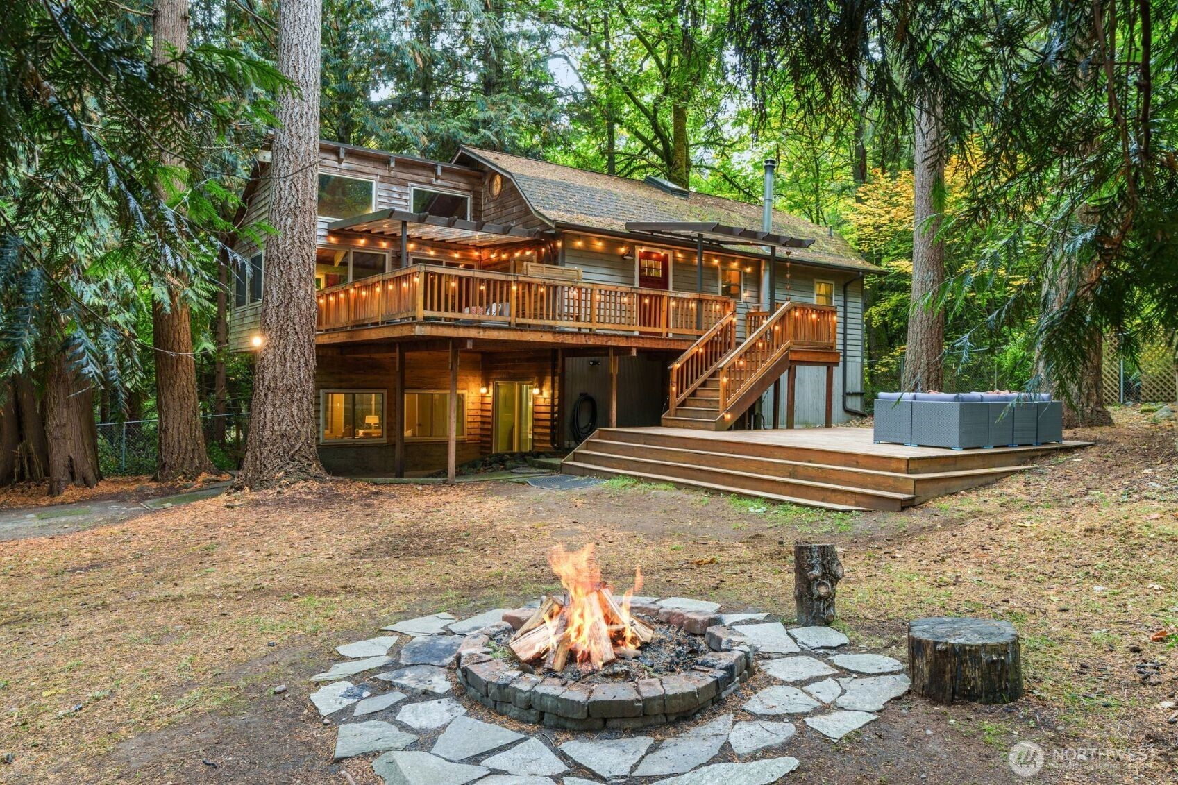 19124 Southeast 213th Street Renton, WA 98058 - Photo 2 of 33 a front view of a house with a yard