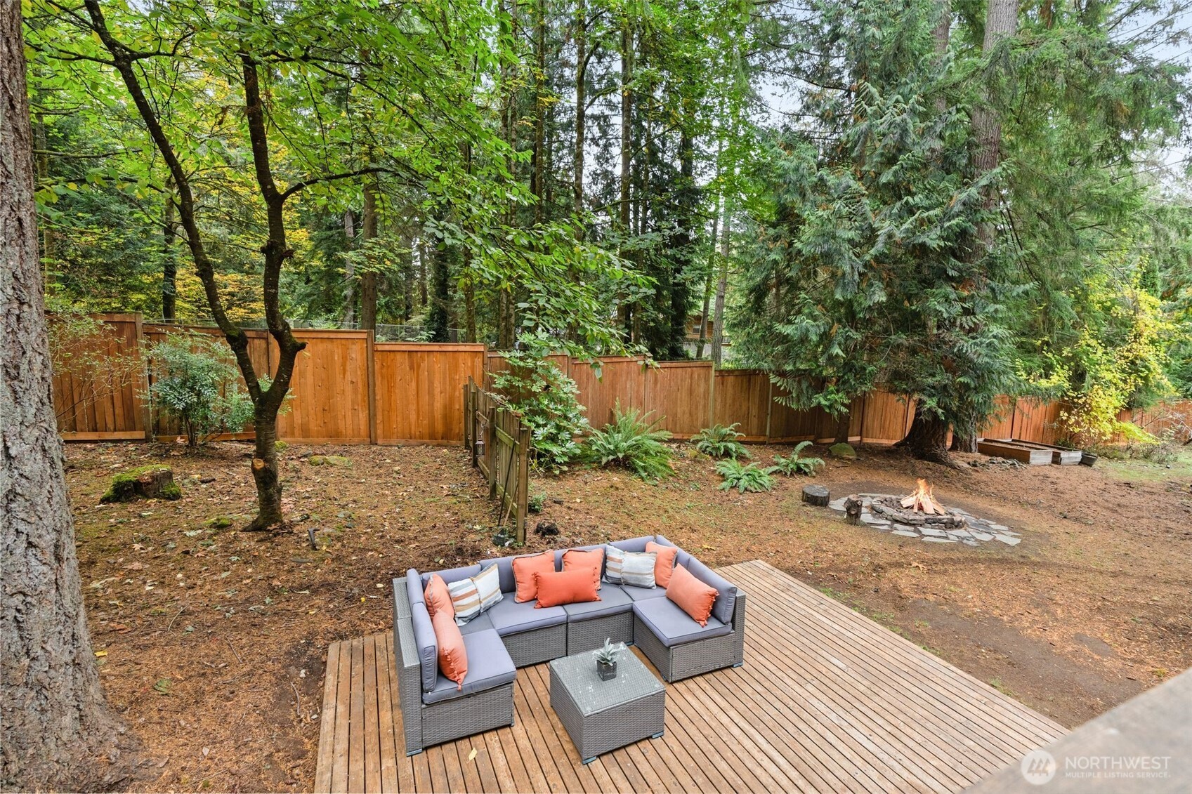 19124 Southeast 213th Street Renton, WA 98058 - Photo 26 of 33 a backyard of a house with seating space