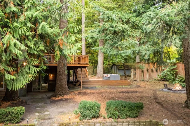 a view of a lake with a house in the background