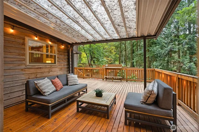 a outdoor living space with furniture and garden view