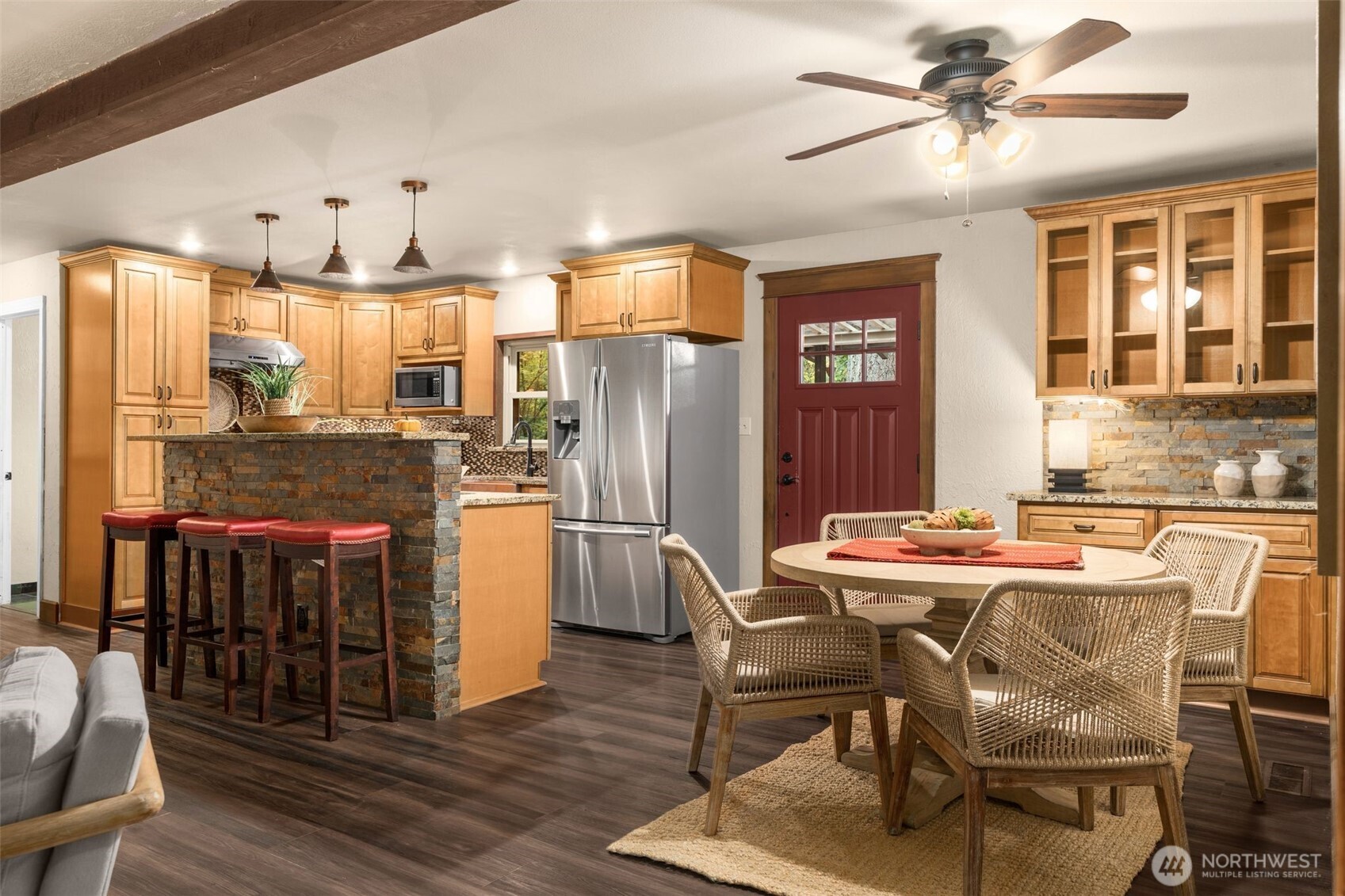 19124 Southeast 213th Street Renton, WA 98058 - Photo 8 of 33 a view of a dining room with furniture window and wooden floor