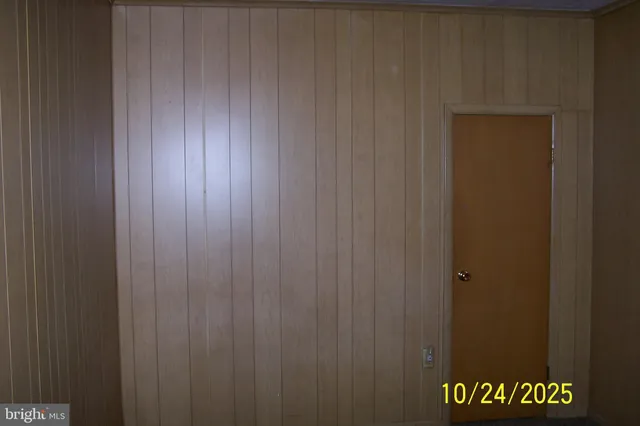 a view of a door and a window