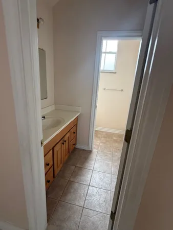 a bathroom with a bathtub and a sink