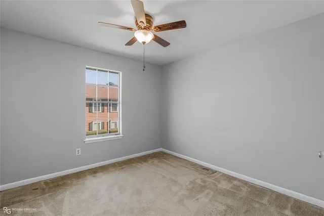 a bathroom with a double vanity sink and mirror