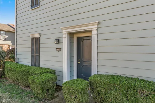 a view of a refrigerator in a kitchen