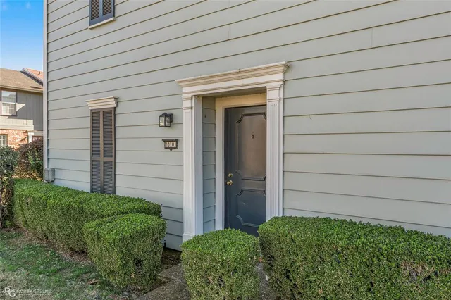 a view of a refrigerator in a kitchen
