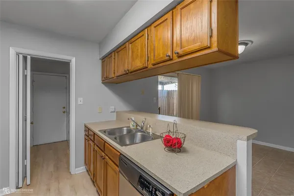 a kitchen with a stove and a microwave