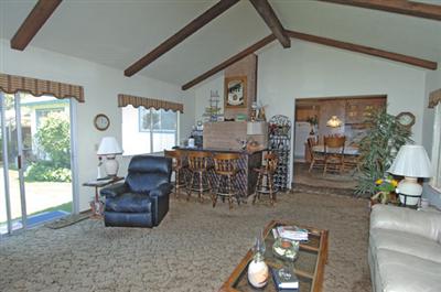 1253 St Francis Road Santa Rosa, CA 95409 - Photo 3 of 12 a living room with furniture and a large window