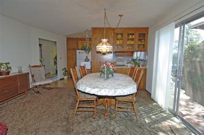 1253 St Francis Road Santa Rosa, CA 95409 - Photo 4 of 12 a dining room with furniture a chandelier and window