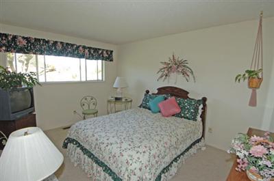 1253 St Francis Road Santa Rosa, CA 95409 - Photo 5 of 12 a bedroom with a bed and a window