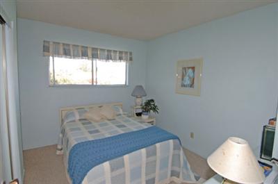 1253 St Francis Road Santa Rosa, CA 95409 - Photo 7 of 12 a bedroom with a bed and a window