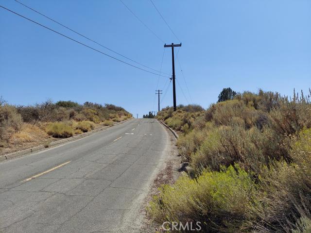 0 Fox Ridge Tehachapi, CA 93561 - Photo 5 of 5 a view of a dry yard with a tree