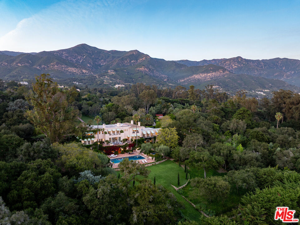 670 Hot Springs Road Montecito, CA 93108 - Photo 13 of 36 a view of a lush green field with mountains in the background