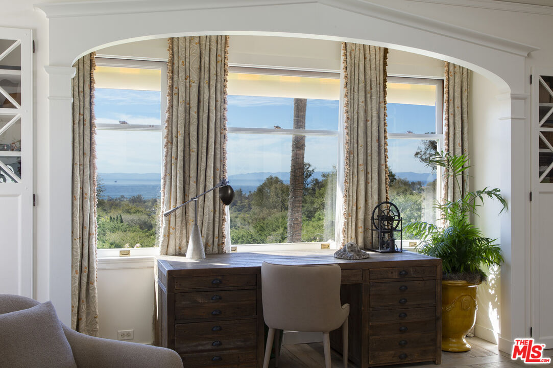 670 Hot Springs Road Montecito, CA 93108 - Photo 20 of 36 a view of a dining room with furniture window and wooden floor