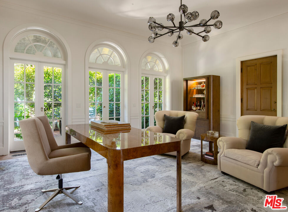 670 Hot Springs Road Montecito, CA 93108 - Photo 22 of 36 a living room with furniture and a large window