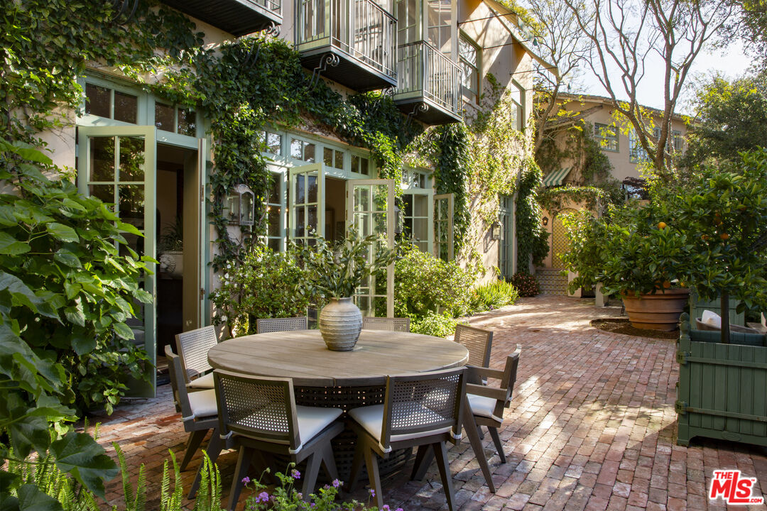 670 Hot Springs Road Montecito, CA 93108 - Photo 29 of 36 a view of outdoor dining space with a table and chairs