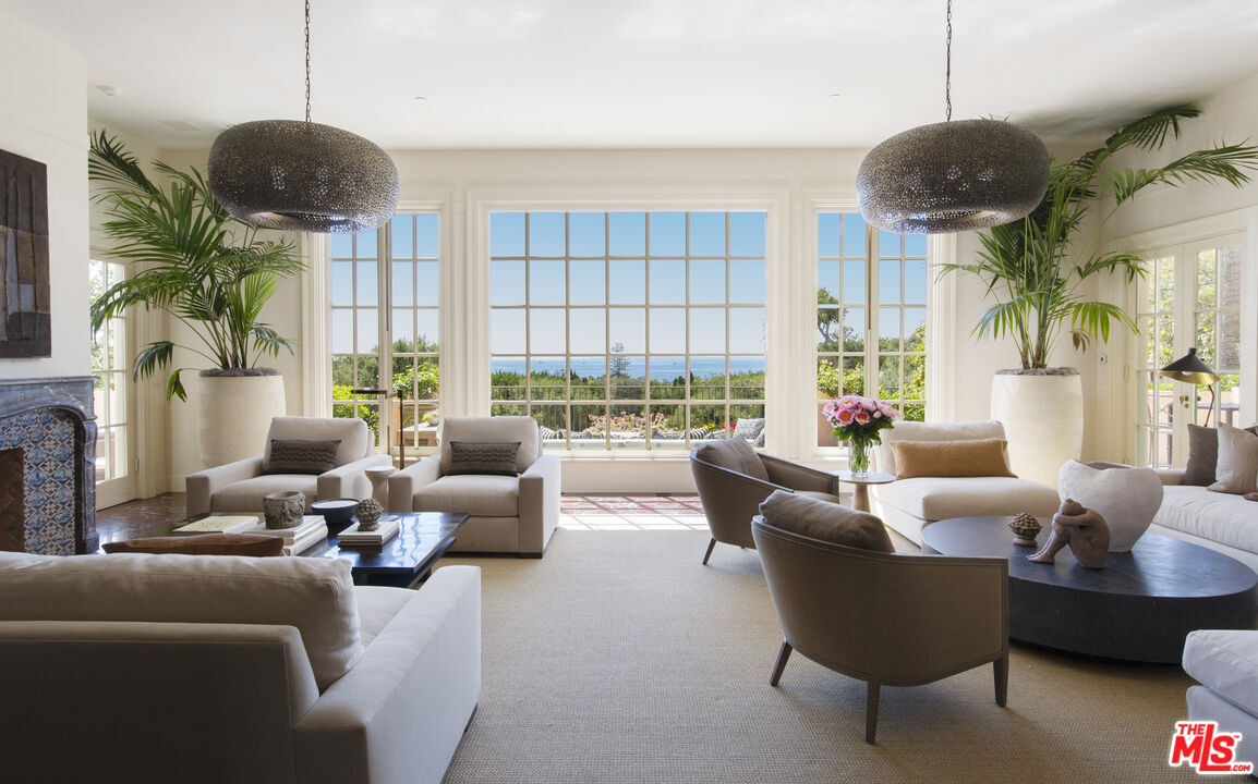 670 Hot Springs Road Montecito, CA 93108 - Photo 5 of 36 a living room with furniture and a large window