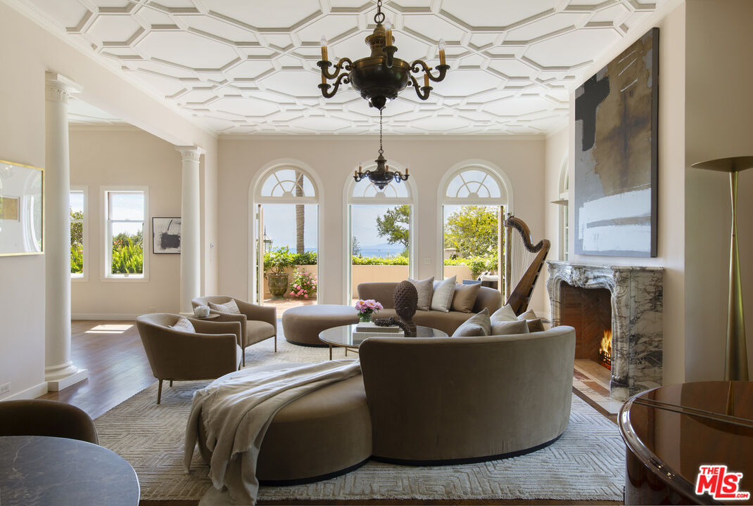 670 Hot Springs Road Montecito, CA 93108 - Photo 8 of 36 a living room with furniture and a large window