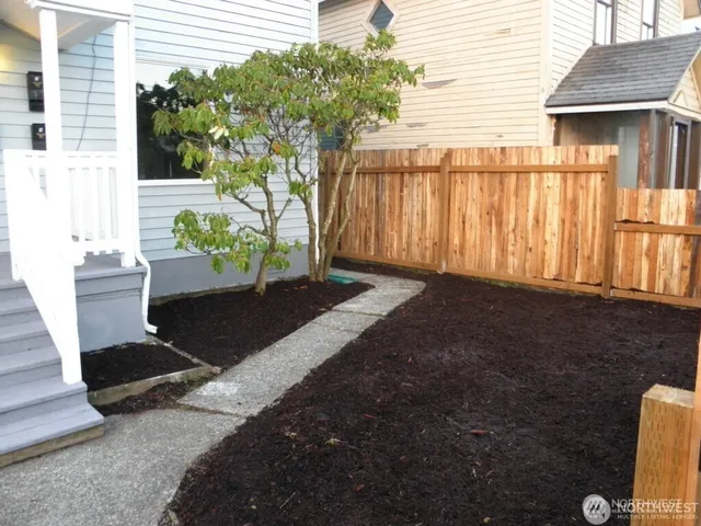 a view of a back yard of the house