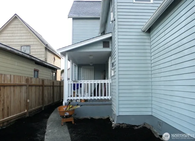 a view of a porch with wooden floor